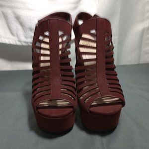 A PAIR OF VELOUR HEELS SPEED LIMIT 98